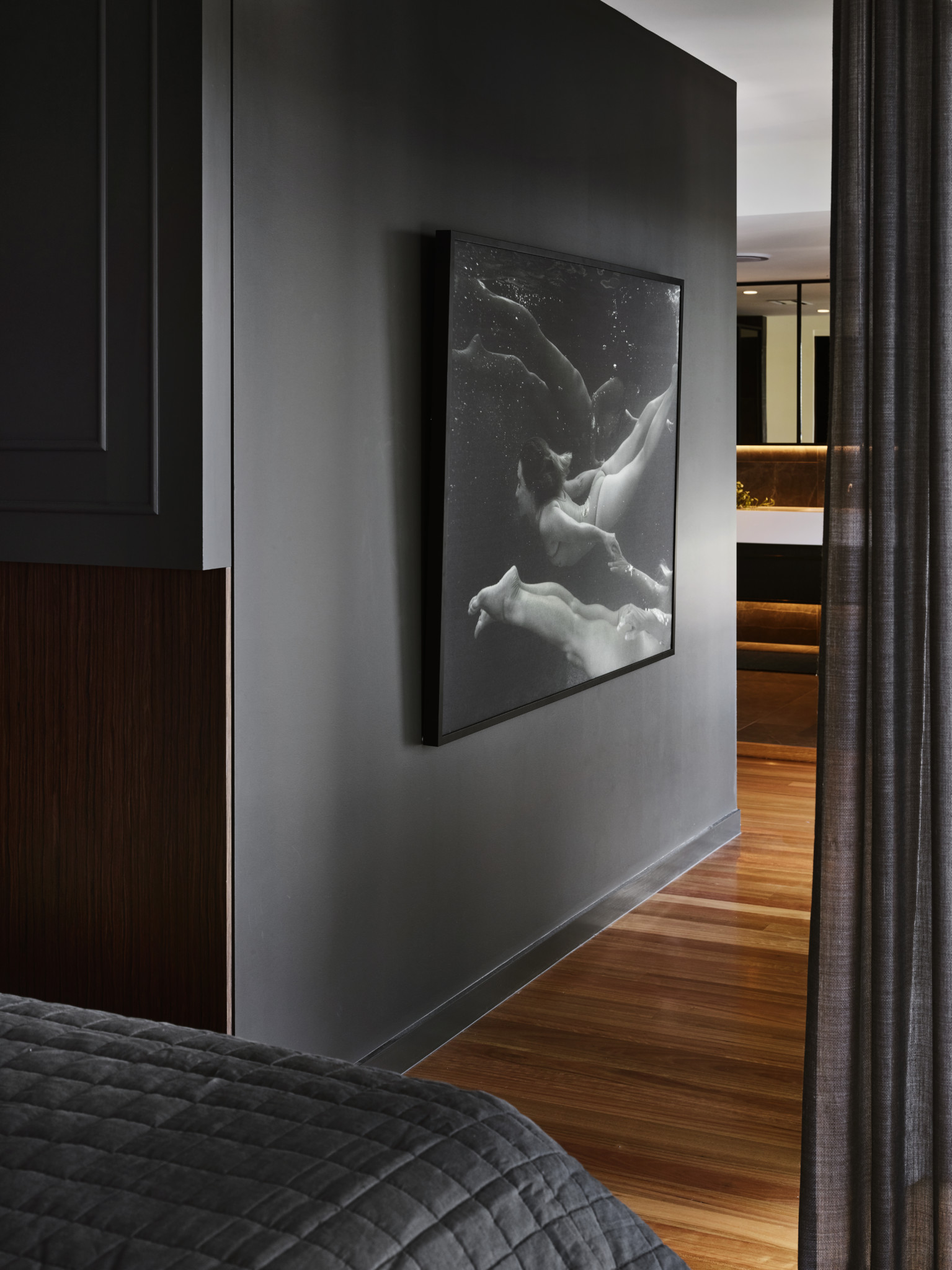 bedroom with picture frame on the wall