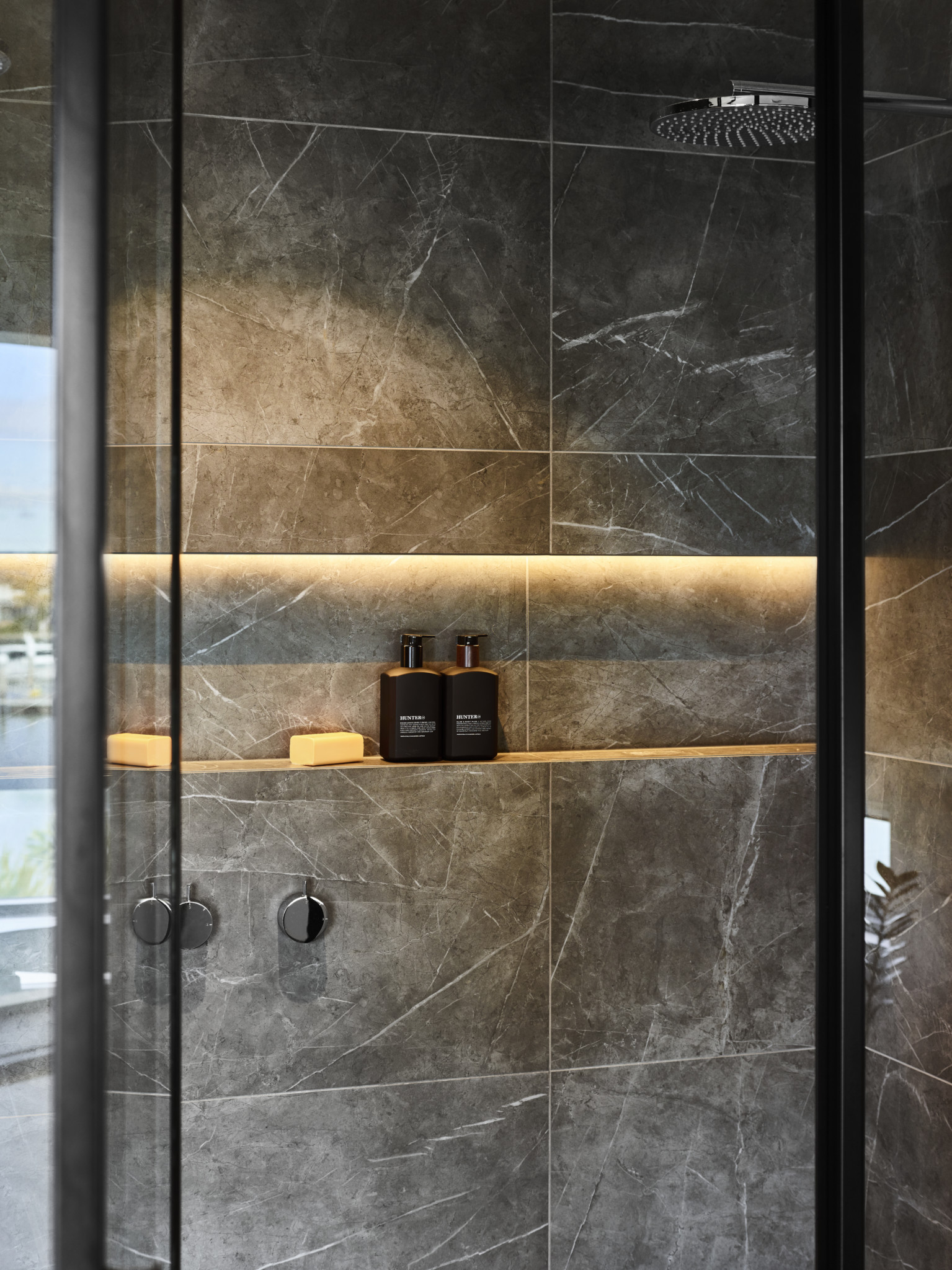 bathroom shower wall with organizer