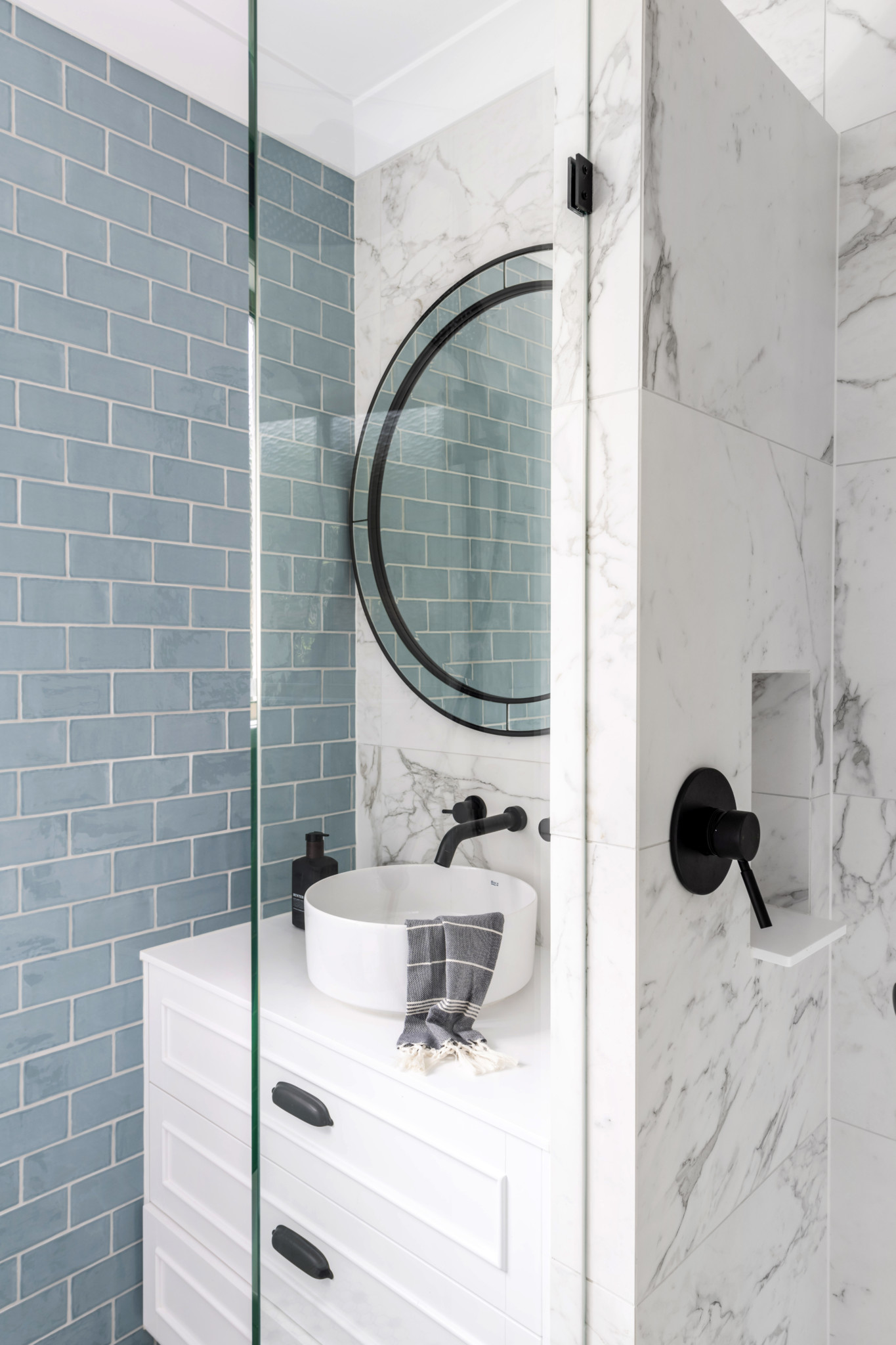 bathroom sink with cabinet below