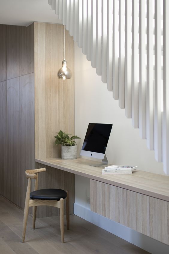 Design by Pitch Architecture under stairs