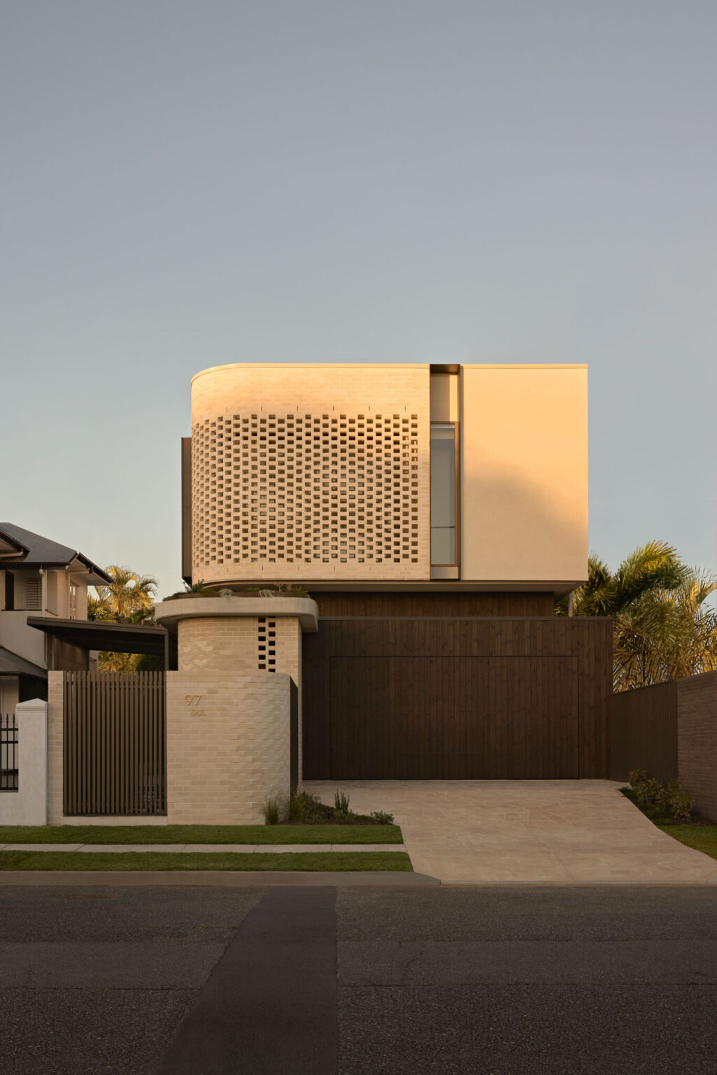 Architectural design Brisbane luxury modern home with curved brick facade